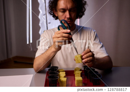Hands Skillfully Managing Hydroponic Growing Medium with Exact Precise Careful Techniques Hands Skillfully Managing Hydroponic Growing Medium with Exact Precise Careful Techniques 128788817