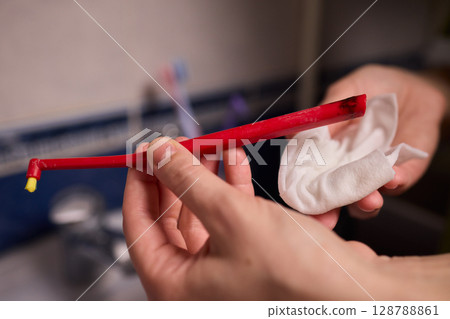Ensuring your Toothbrush is thoroughly cleaned for optimal oral hygiene practices is essential 128788861
