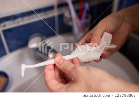 Ensuring your Toothbrush is thoroughly cleaned for optimal oral hygiene practices is essential Ensuring your Toothbrush is thoroughly cleaned for optimal oral hygiene practices is essential 128788862