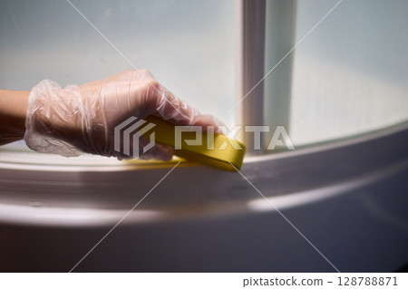 Hand Cleaning Shower with Squeegee Ensuring Hygiene and Freshness in Action Every Time 128788871
