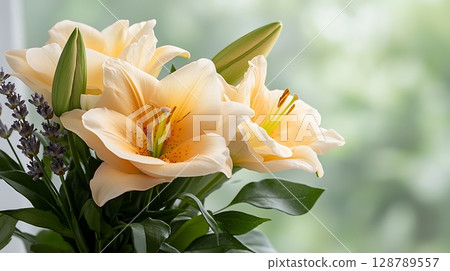 Soft Peach Lilies and Lavender in a Fresh Floral Arrangement Against a Natural Background 128789557