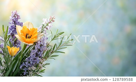 Vibrant Spring Bouquet with Yellow Tulip and Purple Flowers Against Soft Background 128789588