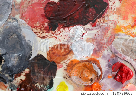 A palette with acrylic colours. 128789663
