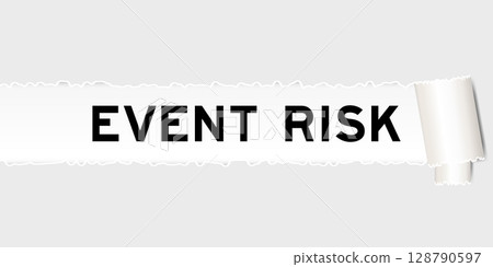 Ripped gray paper background that have word event risk under torn part 128790597