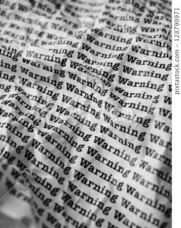 Words Warning Seamless print on crumpled paper for business background. Words Warning Seamless print on crumpled paper for business background. 128790971