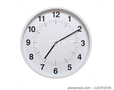 Simple white analog wall clock showing exactly 07:10 or 19:10. suitable for concepts like deadline, start or end of time. Isolated on a clean white background. Simple white analog wall clock showing exactly 07:10 or 19:10. suitable for concepts like deadline, start or end of time. Isolated on a clean white background. 128791036