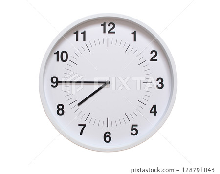 Simple white analog wall clock showing exactly 07:45 or 19:45. suitable for concepts like deadline, start or end of time. Isolated on a clean white background. Simple white analog wall clock showing exactly 07:45 or 19:45. suitable for concepts like deadline, start or end of time. Isolated on a clean white background. 128791043