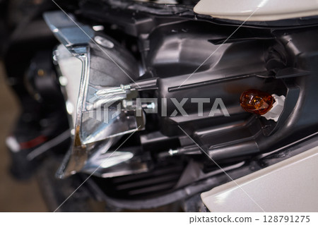 A Detailed Close Up View of an Automotive Headlight Assembly Displaying Quality and Craftsmanship 128791275