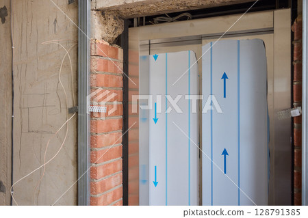 This innovative door frame design specifically caters to the needs of modern interiors 128791385