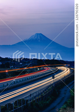 Mount Fuji and light trails shining in the twilight 128791920