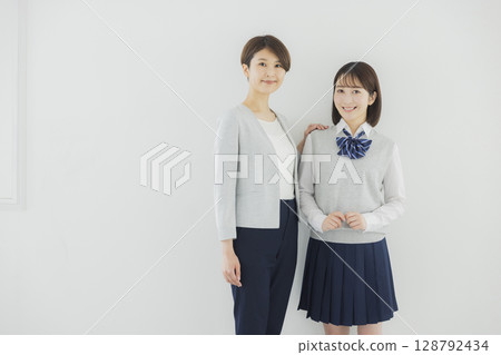 School girls and teachers 128792434