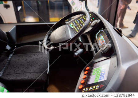 The Modern Bus Interior has a high-tech dashboard and advanced controls for drivers and passengers 128792944