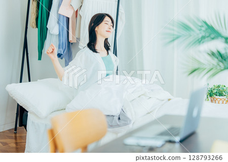 Morning awakening female 30s 128793266