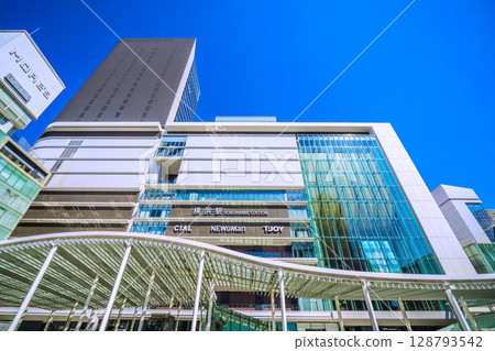 Yokohama cityscape, Japan, July 23rd. Extremely hot...View of Yokohama Station and JR Yokohama Tower Yokohama cityscape, Japan, July 23rd. Extremely hot...View of Yokohama Station and JR Yokohama Tower 128793542