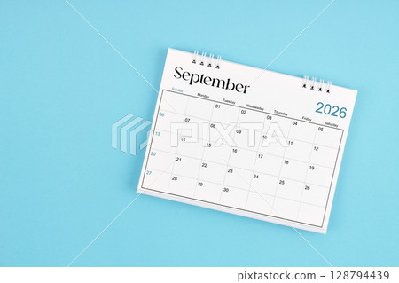 September 2026 Monthly desk calendar for 2026 year on blue color background. 128794439