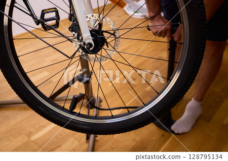 Bicycle Maintenance Guide How to Effectively Pump Up a Tire at Home with Ease and Precision 128795134