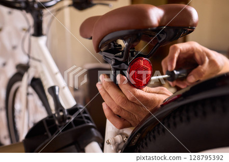 A stylish and modern bicycle handlebar designed with an LED light and integrated cables A stylish and modern bicycle handlebar designed with an LED light and integrated cables 128795392