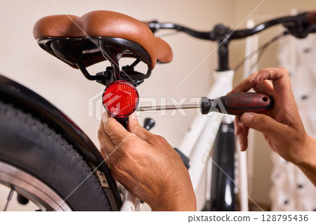 A stylish and modern bicycle handlebar designed with an LED light and integrated cables 128795436