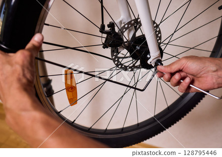 Close Up of a Bicycle Gear and Chain Highlighting Their Design and Functionality Close Up of a Bicycle Gear and Chain Highlighting Their Design and Functionality 128795446