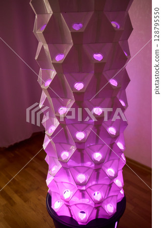 Sustainable Agriculture. Hydroponics based production method farm. Wellness, healthy and sustainable food sourcing concept. Vertical Farming. 128795550