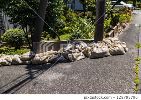 Flood prevention: Sandbags Flood prevention: Sandbags 128795796