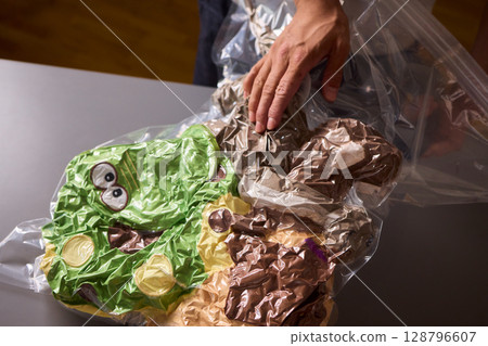 Vacuum Packing Clothing for Effective Space Saving, Efficient Storage, and Better Organization 128796607