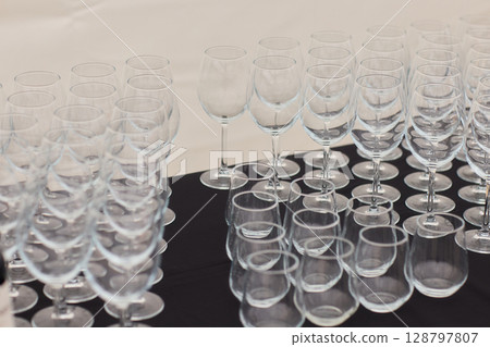 An Elegant and Charming Lineup of Crystal Clear Champagne Flutes Featured at the Event An Elegant and Charming Lineup of Crystal Clear Champagne Flutes Featured at the Event 128797807