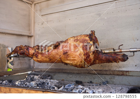 Spit Roasted Whole Animal Cooking A Unique Culinary Experience for Everyone Involved 128798555