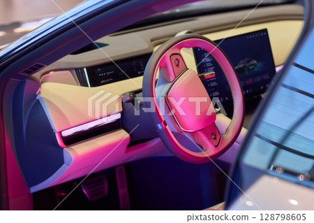 The modern cars steering wheel control panel boosts convenience and performance The modern cars steering wheel control panel boosts convenience and performance 128798605
