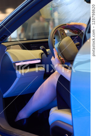 Exploring the Modern Car Interior Experience Through a Drivers Perspective in Detail 128798620