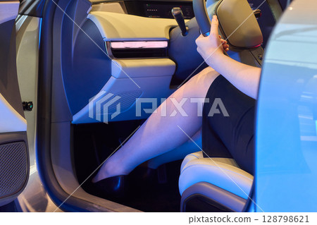 Exploring the Modern Car Interior Experience Through a Drivers Perspective in Detail Exploring the Modern Car Interior Experience Through a Drivers Perspective in Detail 128798621