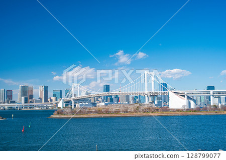 cityscape of Tokyo skyline with Tokyo tower and rainbow bridge at daytime in Japan cityscape of Tokyo skyline with Tokyo tower and rainbow bridge at daytime in Japan 128799077
