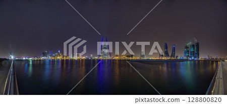 Skyline of Manama Bahrain with reflections at night Skyline of Manama Bahrain with reflections at night 128800820