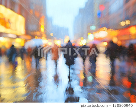 A rainy city square is viewed through a blurred, water-streaked window, showing abstract shapes of people and glowing neon lights in blue, orange, and yellow. 128800940