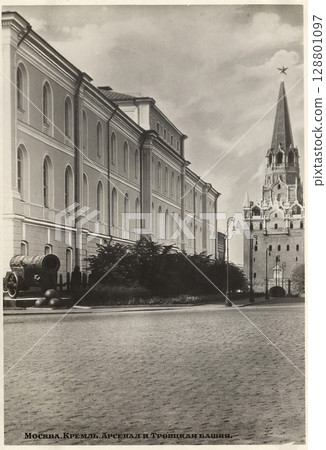 Moscow, Russia - circa 1954: View of the Arsenal and Trinity Tower in the Kremlin. Retro postcard. Inscriptions in Russian. Moscow, Russia - circa 1954: View of the Arsenal and Trinity Tower in the Kremlin. Retro postcard. Inscriptions in Russian. 128801097
