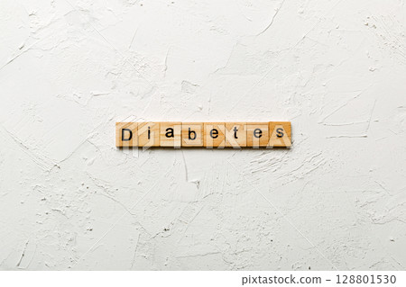 diabetes word written on wood block. diabetes text on table, concept diabetes word written on wood block. diabetes text on table, concept 128801530