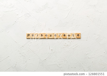 perseverance word written on wood block. perseverance text on table, concept 128801551