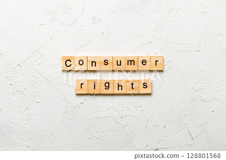 consomer rights word written on wood block. consomer rights text on table, concept 128801568
