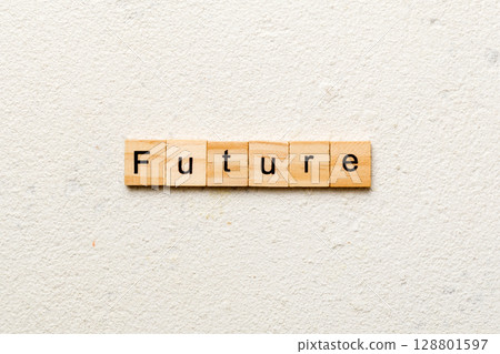 Future word written on wood block. Future text on cement table for your desing, concept Future word written on wood block. Future text on cement table for your desing, concept 128801597