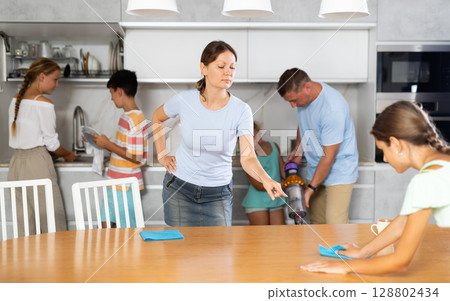 Big family members cleaning their house 128802434