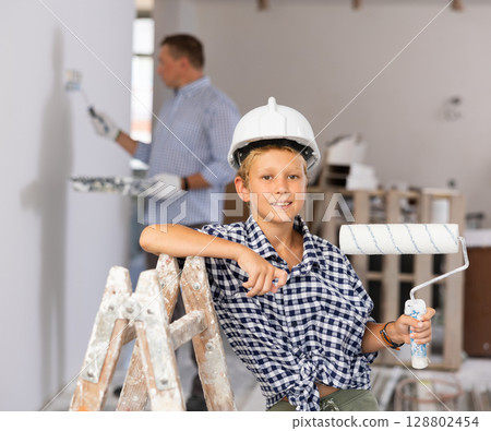 Boy posing with tools for home renovation 128802454