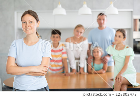 Female with her family on background 128802472