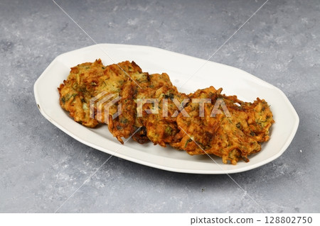 Mucver, Turkish traditional food. (Turkish cuisine) Homemade Food with Zucchini. 128802750
