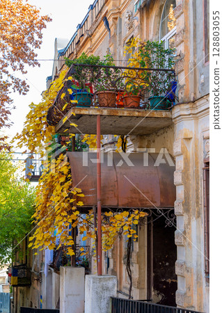 Old Tbilisi with its characteristic ornate balconies. Colorful autumn in Tbilisi 128803055