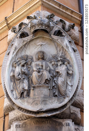 Descent of the Holy Spirit, facade of a palace in Rome, Italy 128803073
