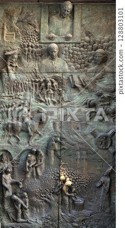 Bronze door on the Cathedral of St Nicholas in Ljubljana, Slovenia Bronze door on the Cathedral of St Nicholas in Ljubljana, Slovenia 128803101
