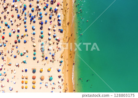 a beach crowded 128803175