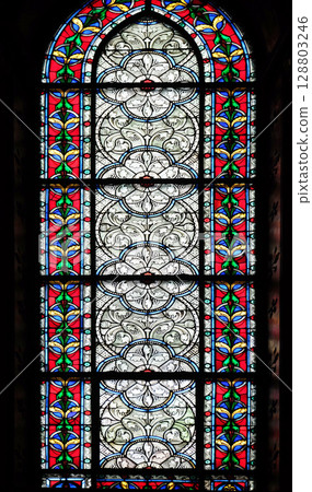 Stained glass windows in the Saint Germain des Pres Church, Paris, France 128803246