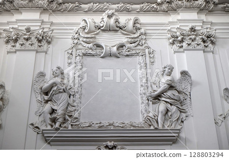 Stucco decoration in Wurzburg Cathedral dedicated to Saint Kilian, Bavaria, Germany Stucco decoration in Wurzburg Cathedral dedicated to Saint Kilian, Bavaria, Germany 128803294