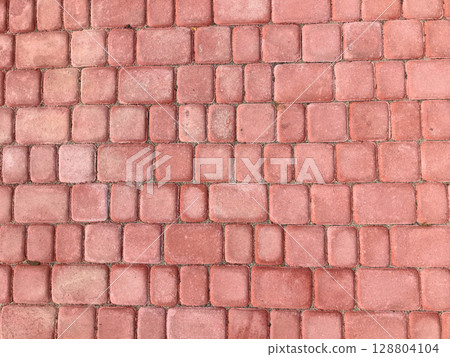 Beautifully arranged terracotta pavement bricks in an outdoor pathway Beautifully arranged terracotta pavement bricks in an outdoor pathway 128804104